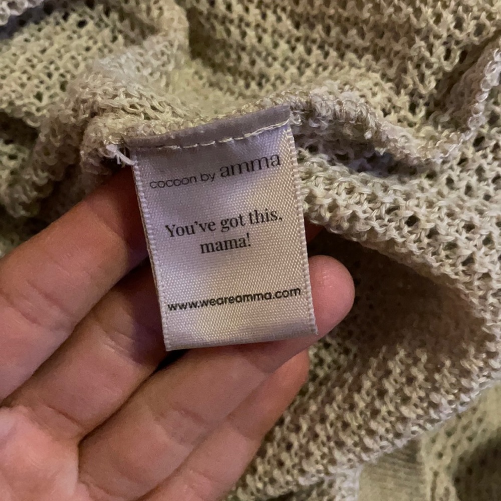Cocoon by Amma.  Beautiful condition, no rips, stains, tears.